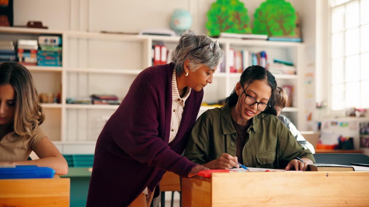 Teacher assisting students in a classroom setting