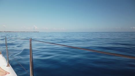 a shot of a maritime landscape taken from a catamaran