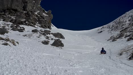 Timelapse-Of-Skier-Hiking-Up-Steep-Hill