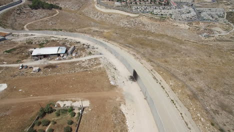 aerial views of the west bank separation wall and surrounding landscape