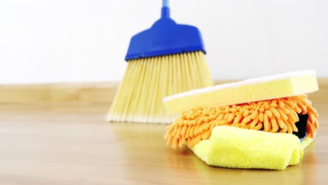 various housekeeping supplies in a bucket