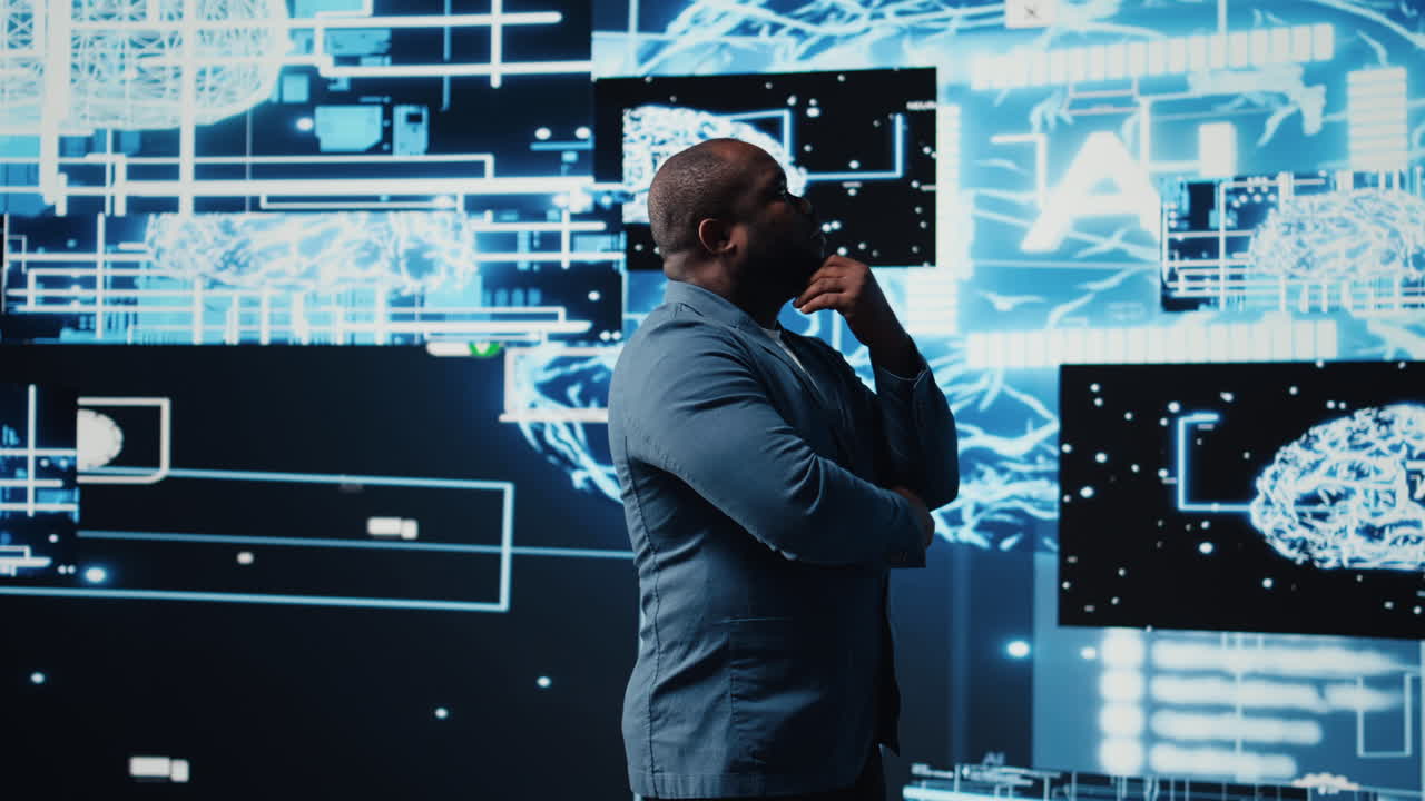 Black IT professional coding for futuristic AI brain blueprints in background