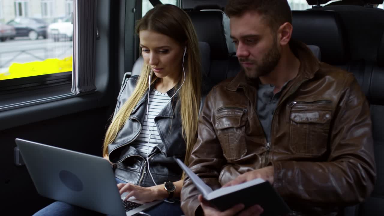 Young Couple Traveling by Car