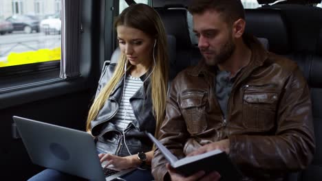 young couple traveling by car