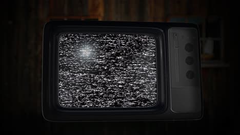 vintage televisions with static and green screen