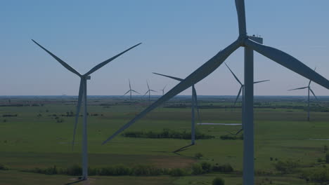 Oklahoma---Turbines-booming-up-on-wide-shot-with-farms-below