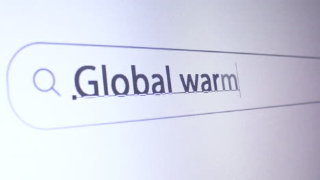 browser bar with typed global warming keyword on the computer screen, seo concept