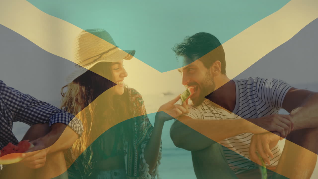 On beach, couple eating watermelon with abstract animation overlay pattern