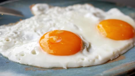 fried eggs on a plate