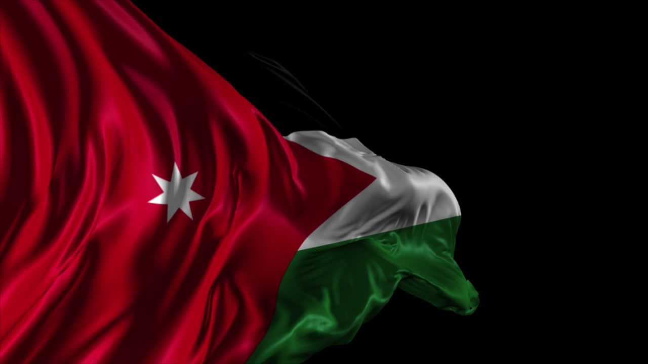 la bandera de jordania ondeando en el viento