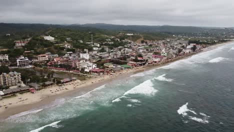 aerial orbit of montanita ecuador. ecuador beach town reveal pacific coast on the ruta del spondylus