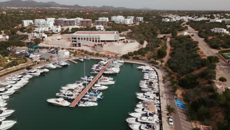 scenic aerial view of cala d'or marina in mallorca with yachts