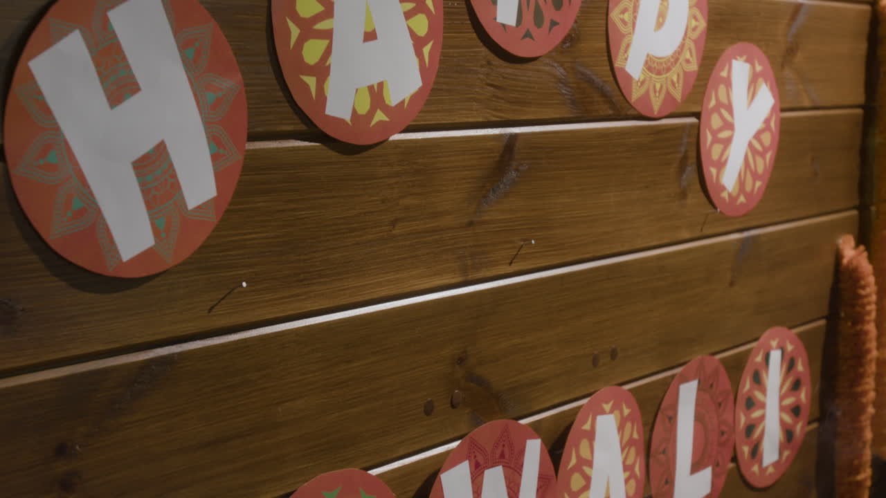 Diwali decorations on a wooden wall