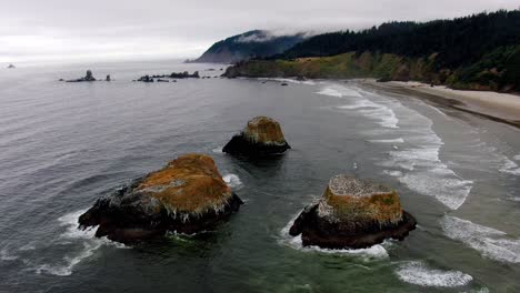 descending panorama of symmetrical rocks on oregon coast