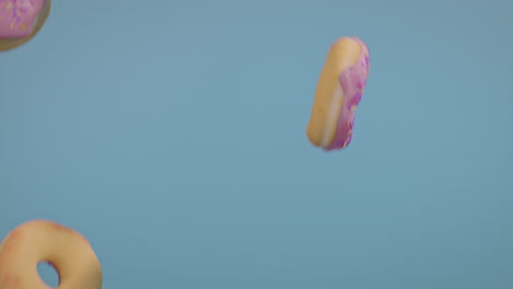 pink glaze donuts on a blue background