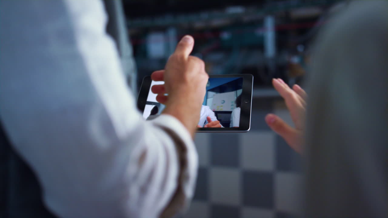 Workers talking cellphone videochat with businessman shoulder view close up