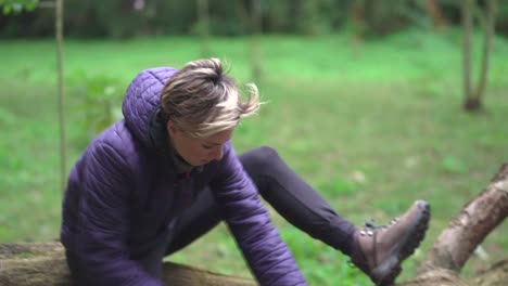 woman preparing to rest in forest