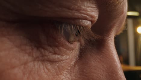 close-up of a man's eye and face
