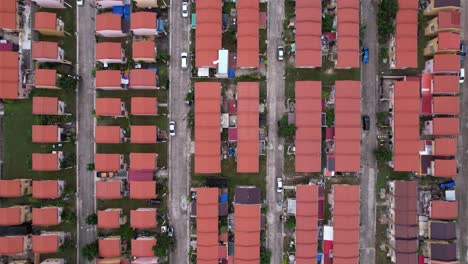 Top-down-aerial-view-of-houses-placed-geometrical-in-a-village