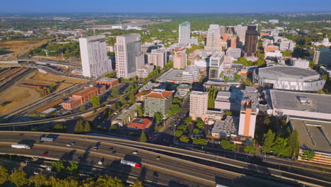 lively traffic of sacramento, california, usa. drone approaching the beautiful downtown with fine architecture on sunny day.