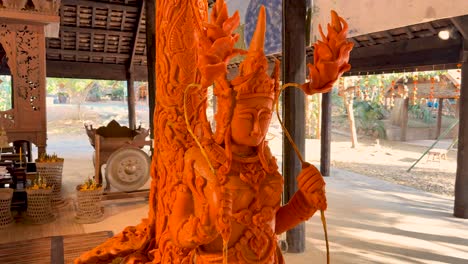 detailed carved candle in serene temple setting