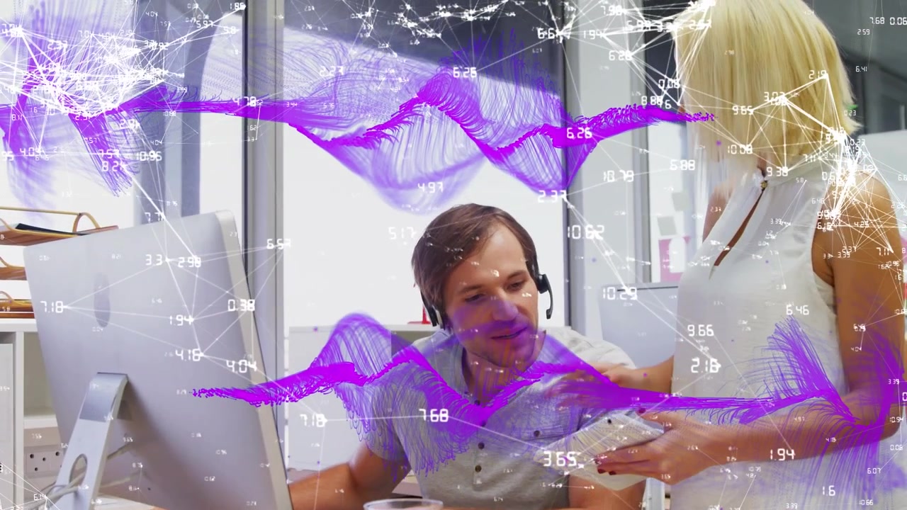 Business Colleagues Collaborating with Digital Data Overlay in Office