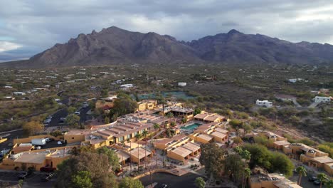 desert oasis resort and pool, aerial shot, 4k