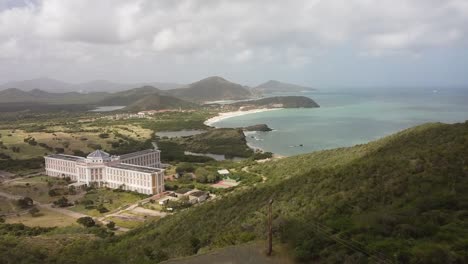 Aerial-revealing-shot-of-Hotel-Hesperia-on-Isla-Margarita-during-cloudy-day