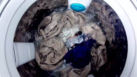 washing machine washes clothes laundry such as colored,time lapse