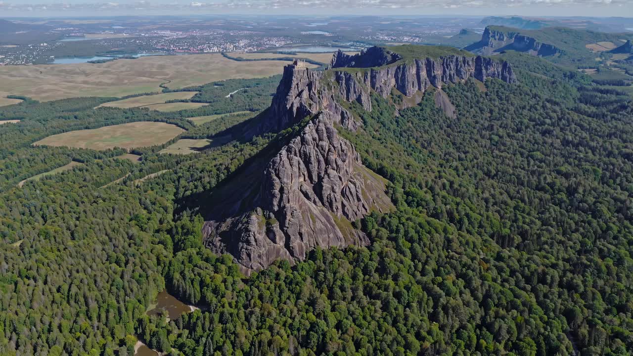 Aerial View of a Mountainous Landscape with Forest