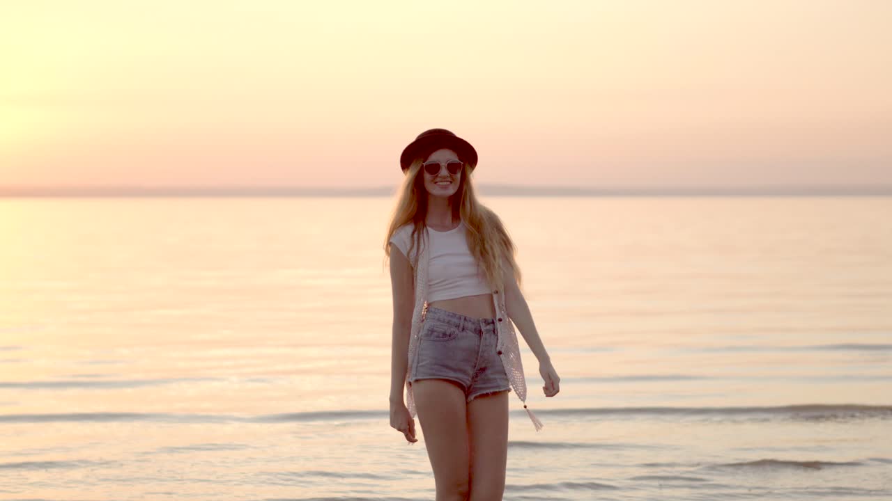 Happy Woman at Sunset Beach