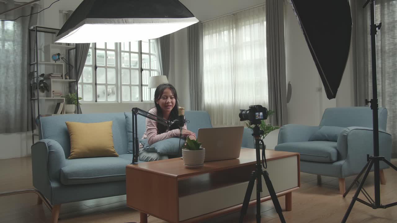 Young girl vlogging from home