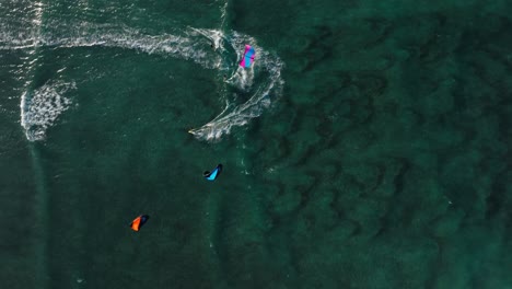 kiteboarding in turquoise water