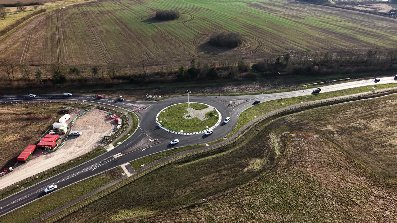 Aerial view of new roundabout facilitating smooth traffic in rural English landscape, Waddesdon, UK