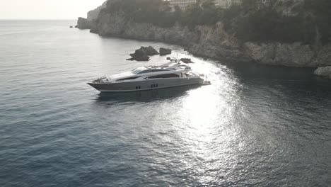 luxury yacht moored in a secluded cove