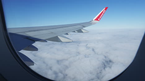 passenger business first class travel flying above the clouds during an intercontinental flight