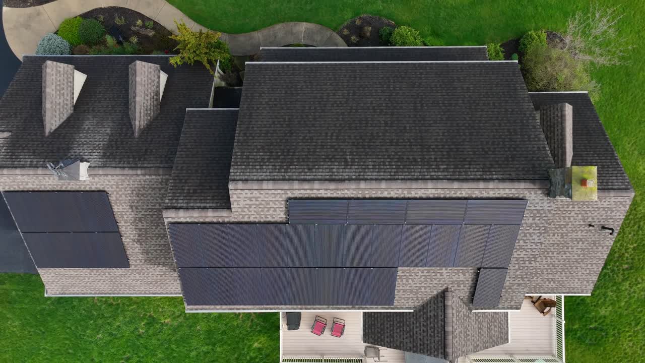 Solar panels on shingle rooftop