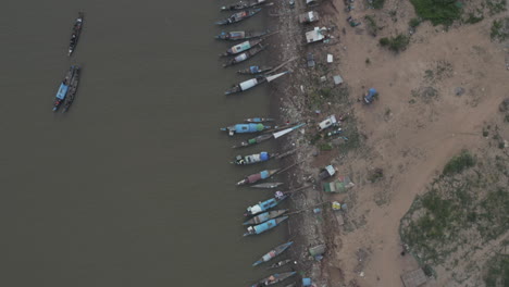 Aerial-of-Fishermen-boats-on-polluted-Tonle-Sap-in-Phnom-Penh