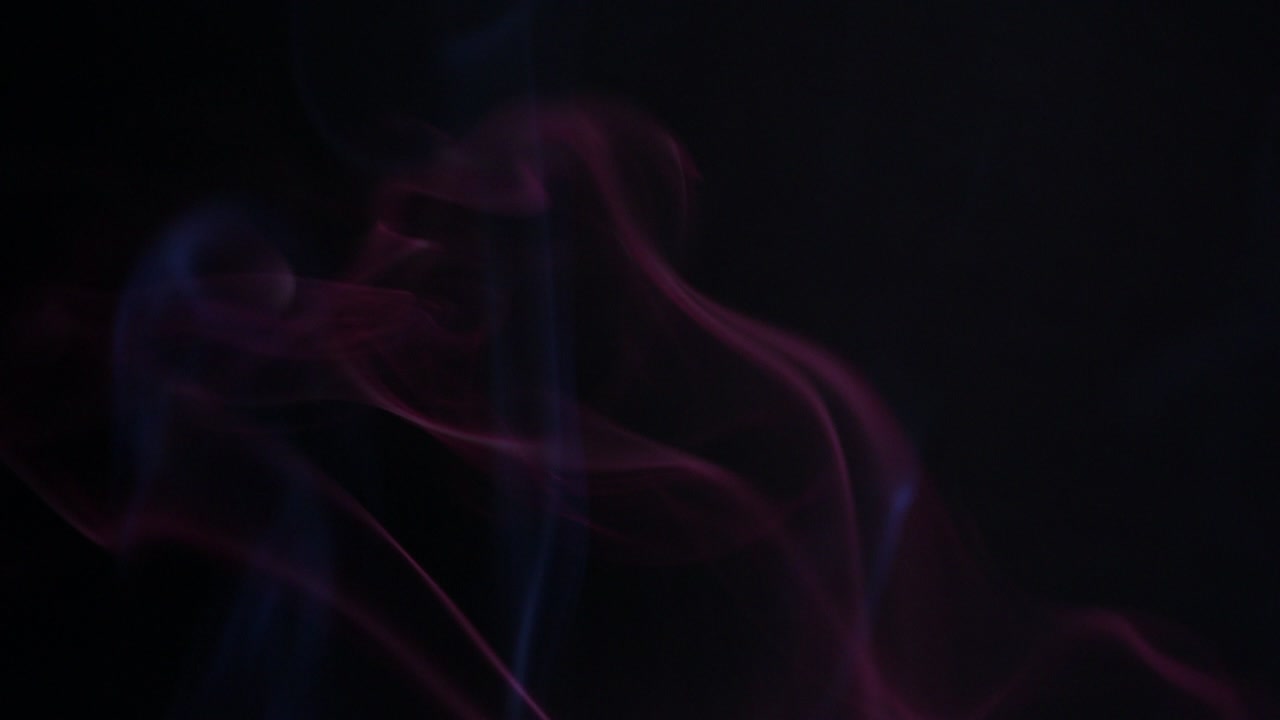 colores humo en fondo oscuro