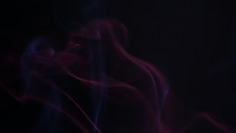 colores humo en fondo oscuro