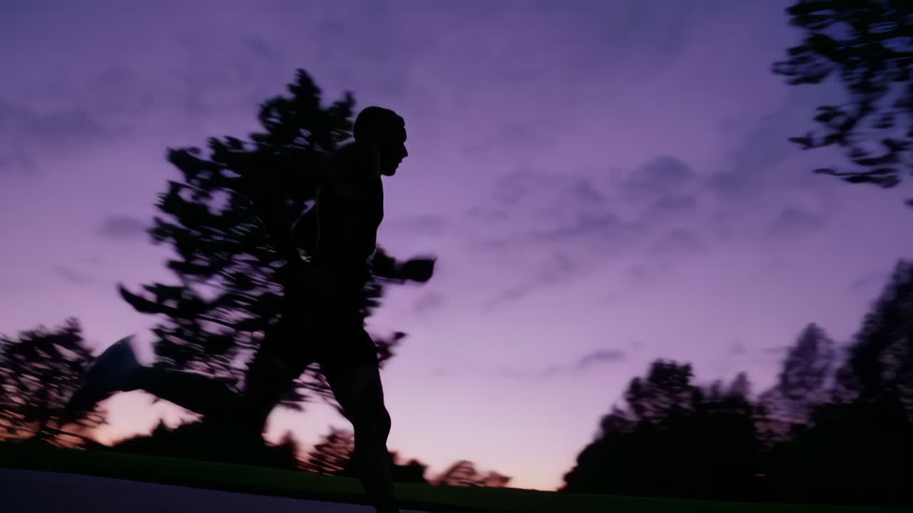 Silhouette of a runner at sunset