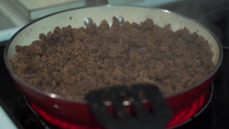 Steam-Coming-Off-Ground-Beef-in-Red-Pan