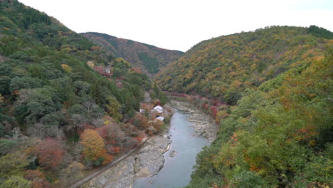 view point of the river and forest in autumn season at arashiyama, japan