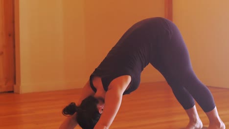 Woman-performing-stretching-exercise