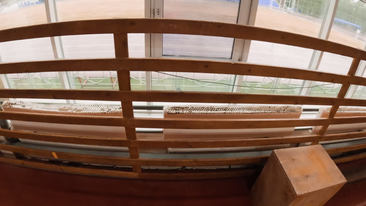 Personal Perspective from a Gym Overlooking an Outdoor Stadium