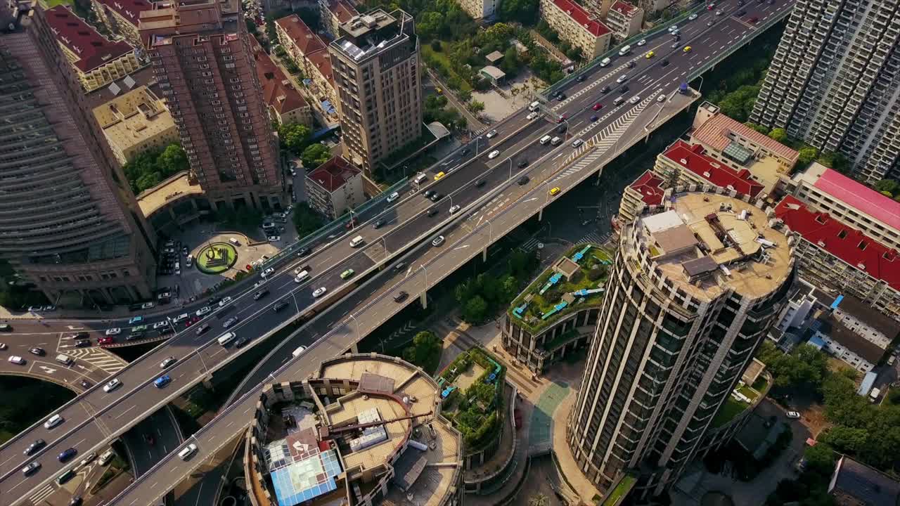 china día soleado ciudad de shanghai famoso tráfico redondo cruce de carreteras panorama aéreo 4k