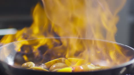preparing flambe dish