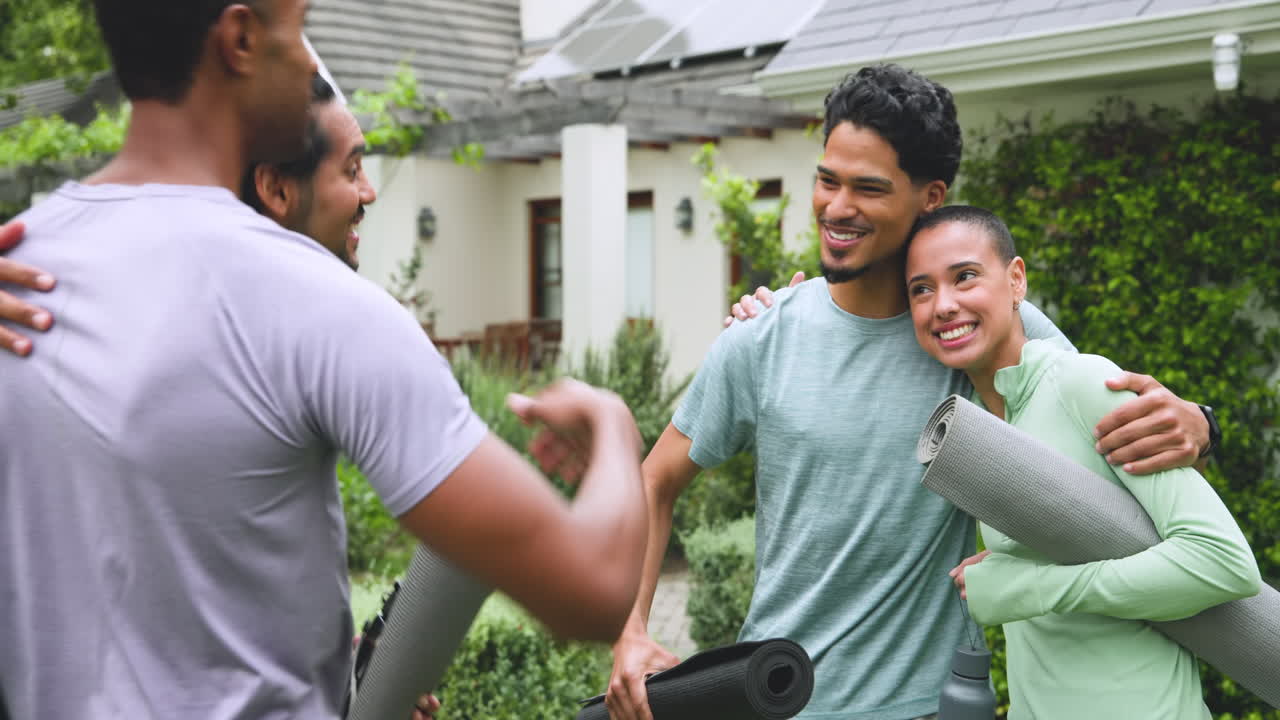 diverse friends gathering outdoors, smiling and holding yoga mats, enjoying time together
