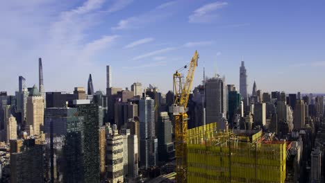 development in new york city, aerial view around a skyscraper construction site in nyc, usa