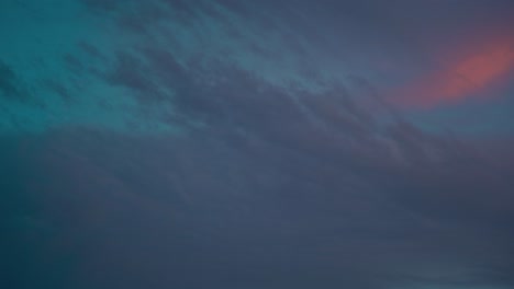 a stunning time lapse of a beautiful sunset, surfing colorful clouds in the blue sky, golden hour, middle east israel, sony 4k video